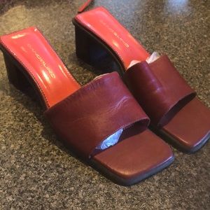 Red slip-On ladies shoes…2” heel. All leather uppers & lining…man made sole